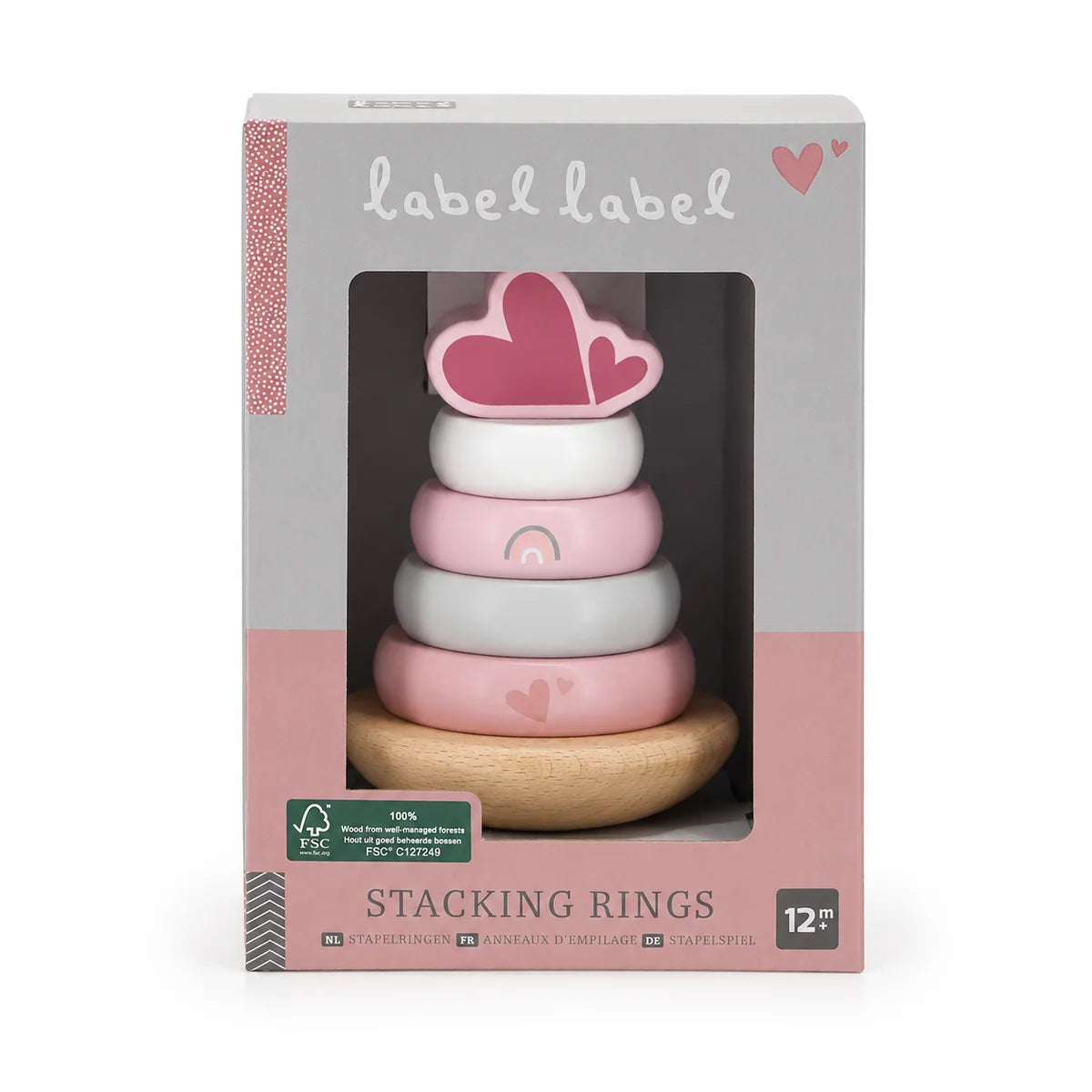 Kind spielt mit personalisiertem Holz Stapelturm in Rosa von Label Label als hochwertiges Geschenk zur Taufe